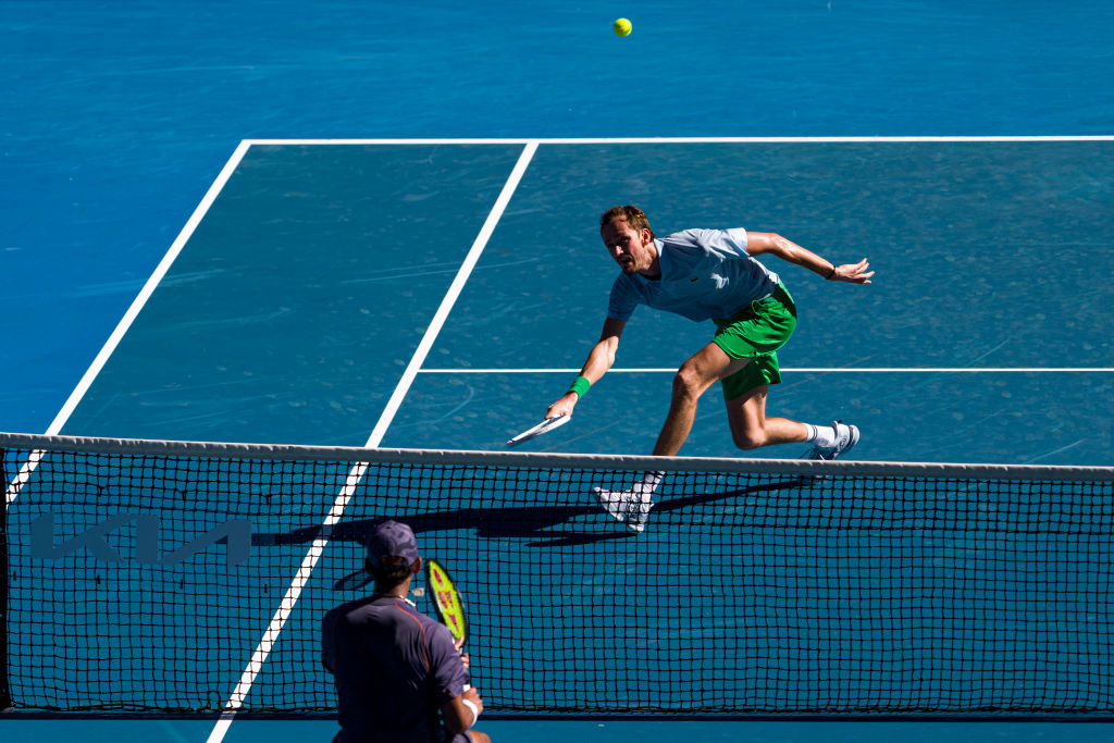 Daniil Medvedev plays a forehand against Kasidit Samrej during their match at the Australian Open...