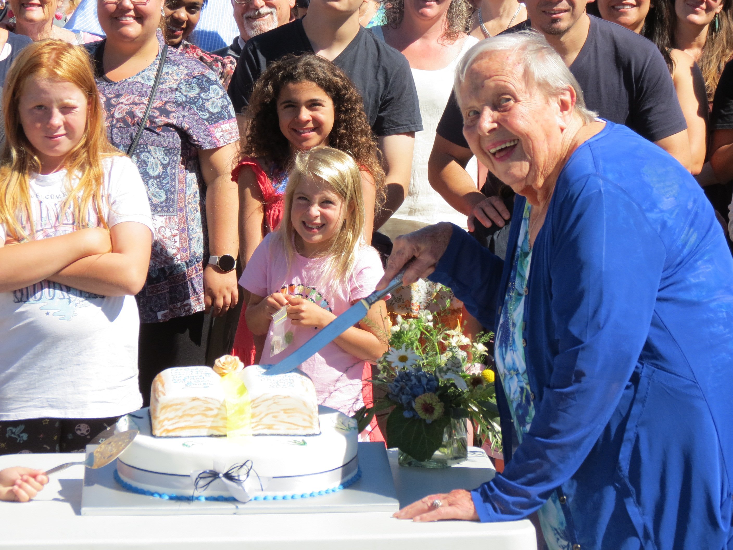 Anne du Mez, 92, cuts the cake celebrating Cromwell and Districts Presbyterian Church’s 150 years...