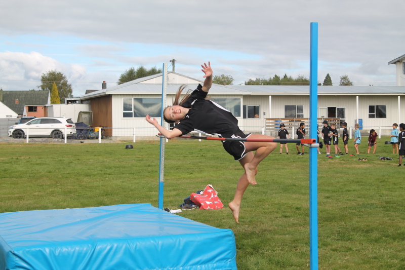 Riversdale School’s Emma Cruikshank, 12, clears the high jump with skill. Photo: ELLA SCOTT-FLEMING