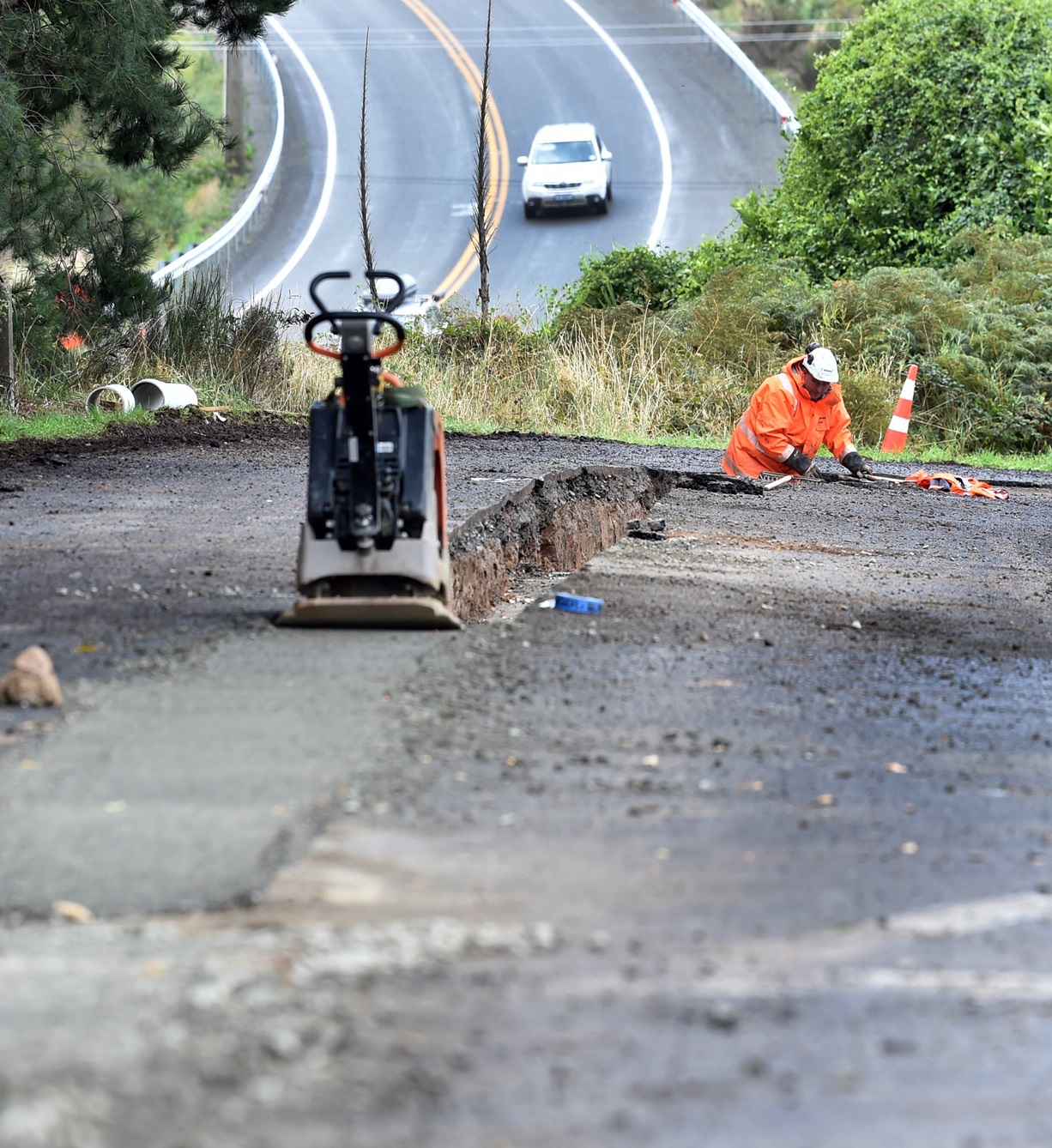 A contractor works in Reeves St, Roseneath, this week as part of an effort to improve resilience...