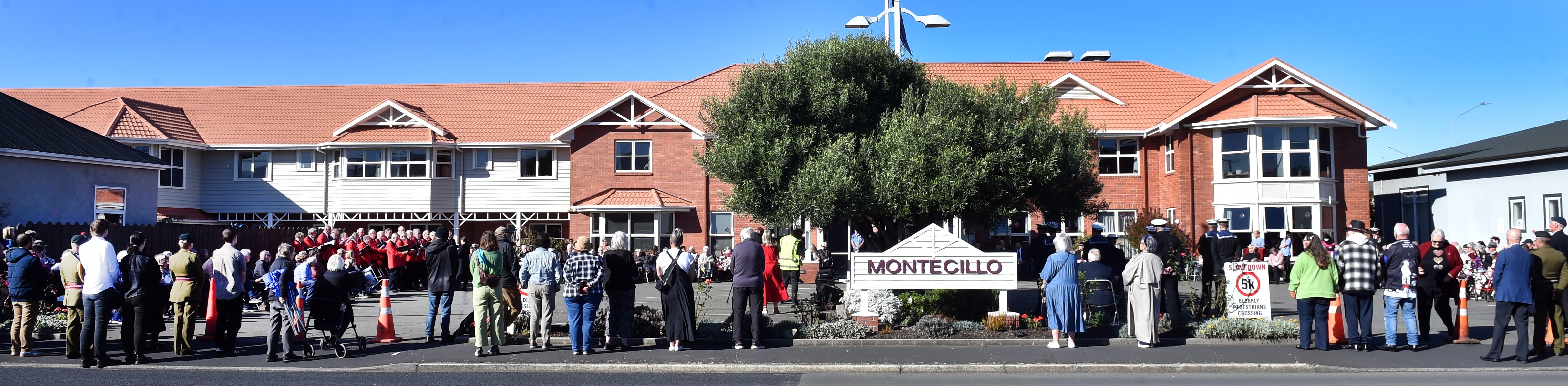 People gather at the 2025 Anzac Day service at the Montecillo Veterans Home and Hospital.