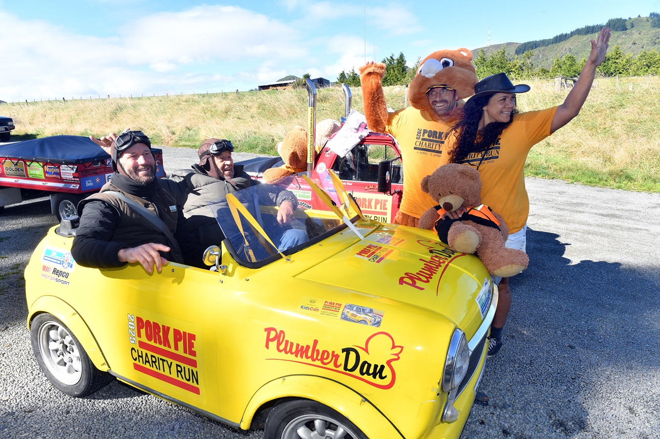 Trailing behind the pack north of Dunedin during the Pork Pie Charity Run are (from left) Dan...