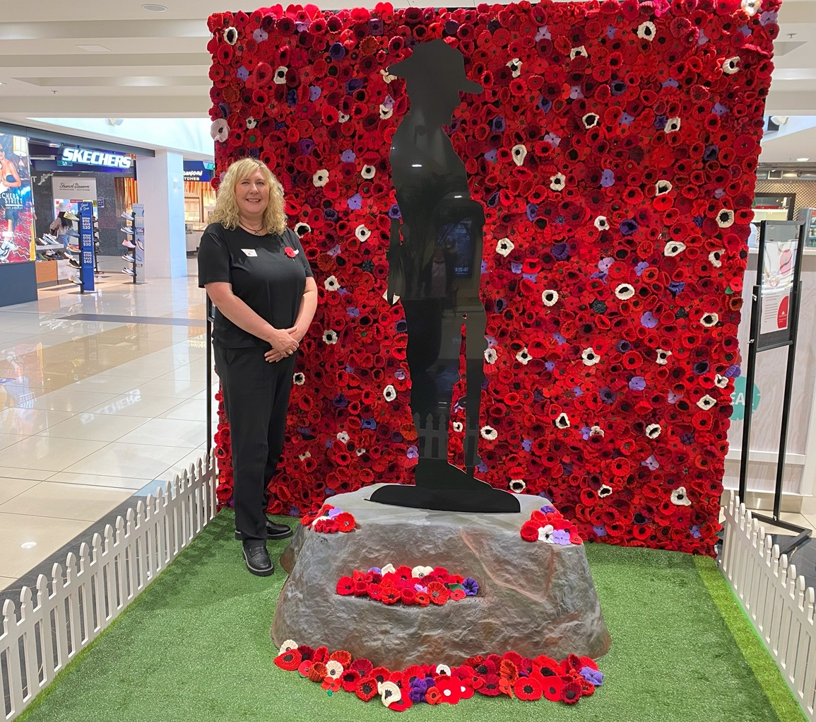 Golden Centre manager Nina Rivett stands with the centre’s Anzac Day display, honouring all those...