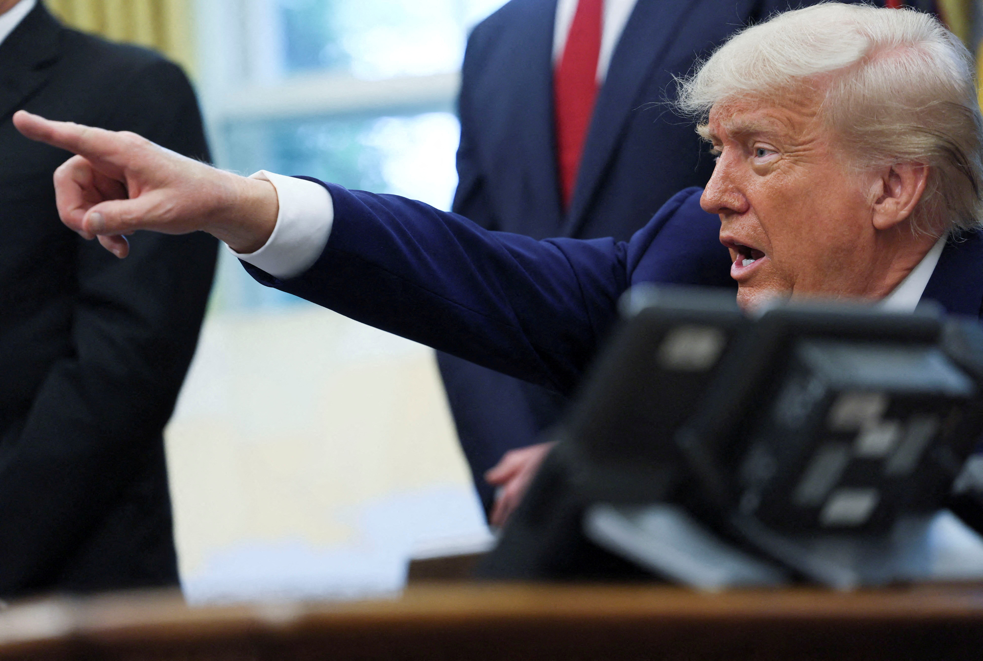 US President Donald Trump takes questions in the Oval Office. Inset: Emperor Nero. PHOTOS:...