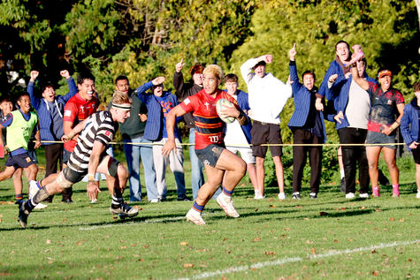 Bishop Neal streaks away to score for St Thomas of Canterbury College. PHOTO: BRENDAN BIGGS