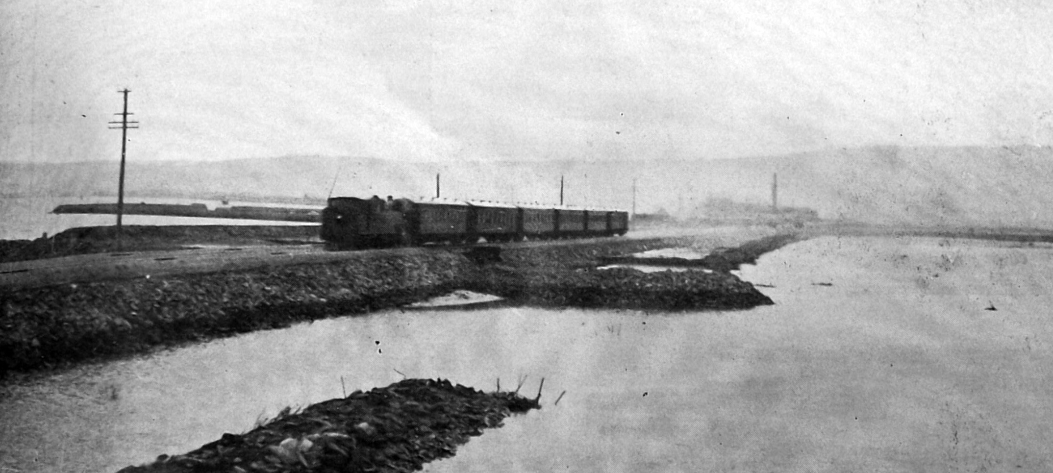 The first passenger train leaves Dunedin using a new railway deviation, avoiding the previous...