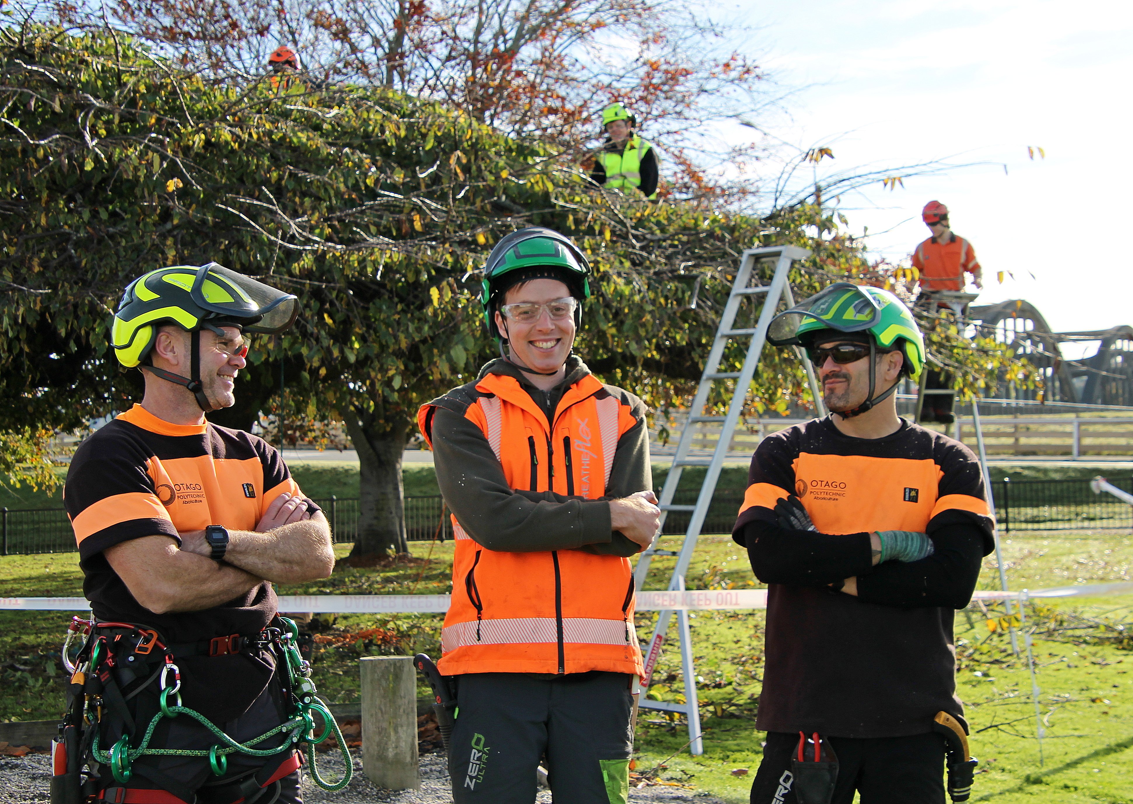 Otago Polytechnic arborists (from left) Ben Fentiman, trainee Ben Russell and Alvar Del Castillo...