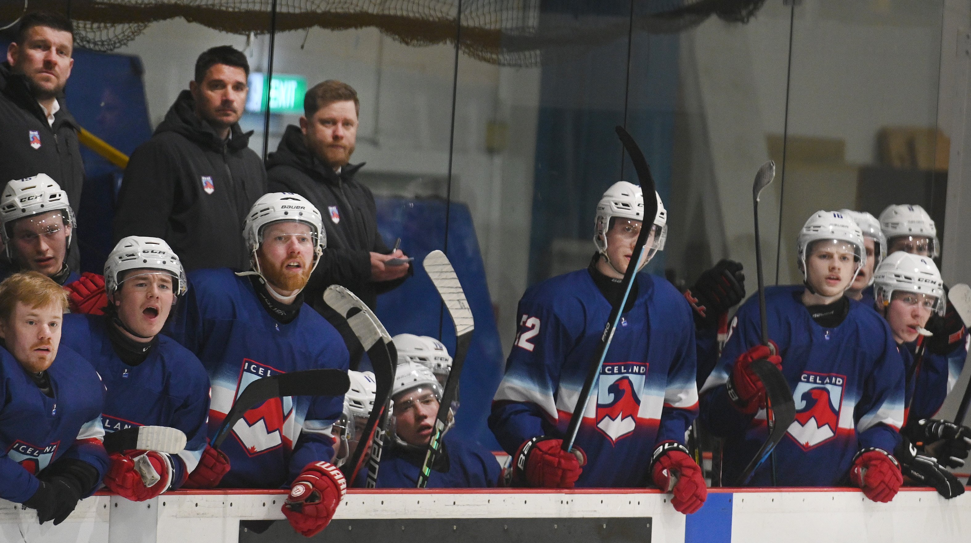 Iceland players cheer their team-mates on during a game at the Dunedin Ice Stadium this week....