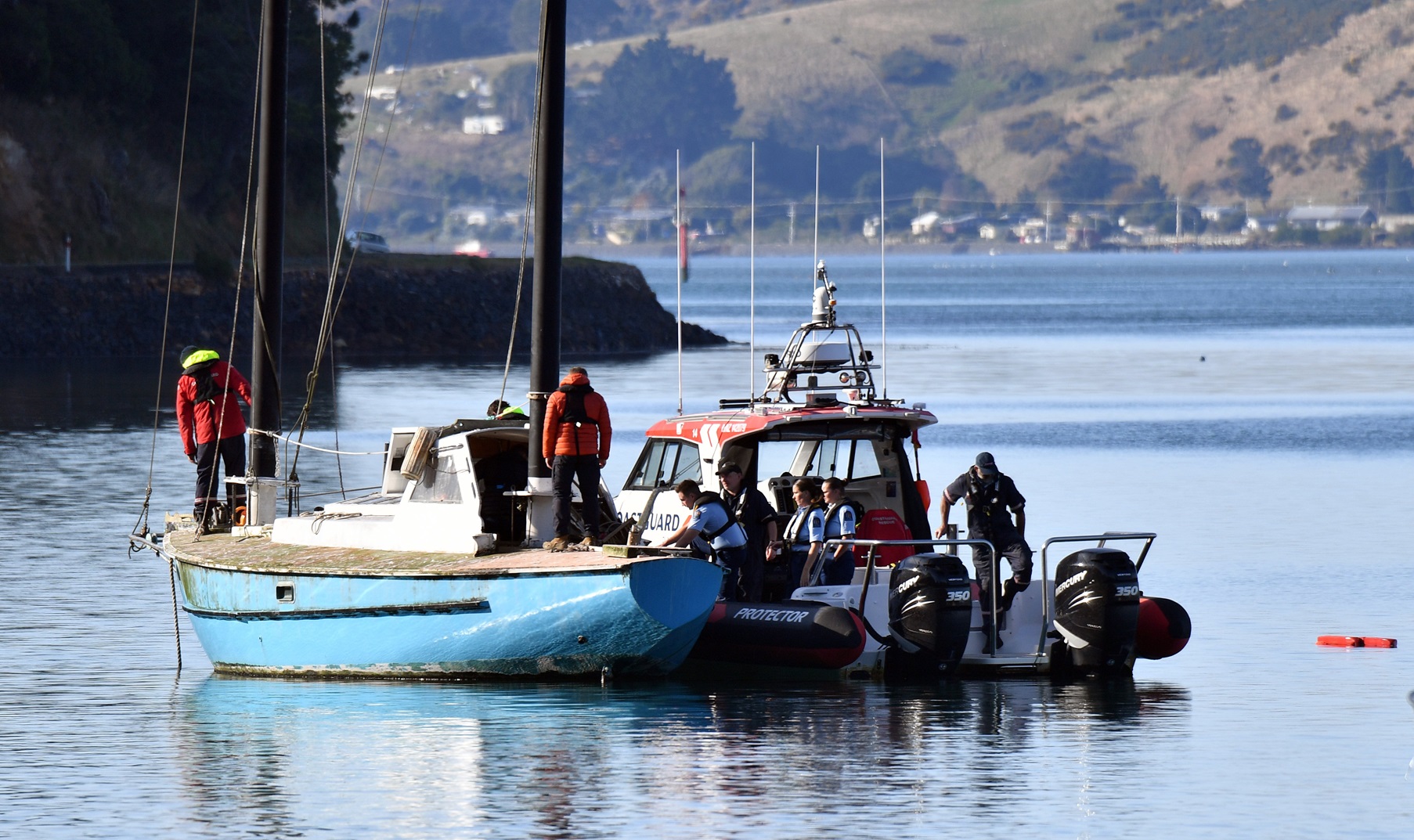 The police dive squad on Murray’s yacht moored at Deborah Bay, in Otago Harbour. Photo: Stephen...