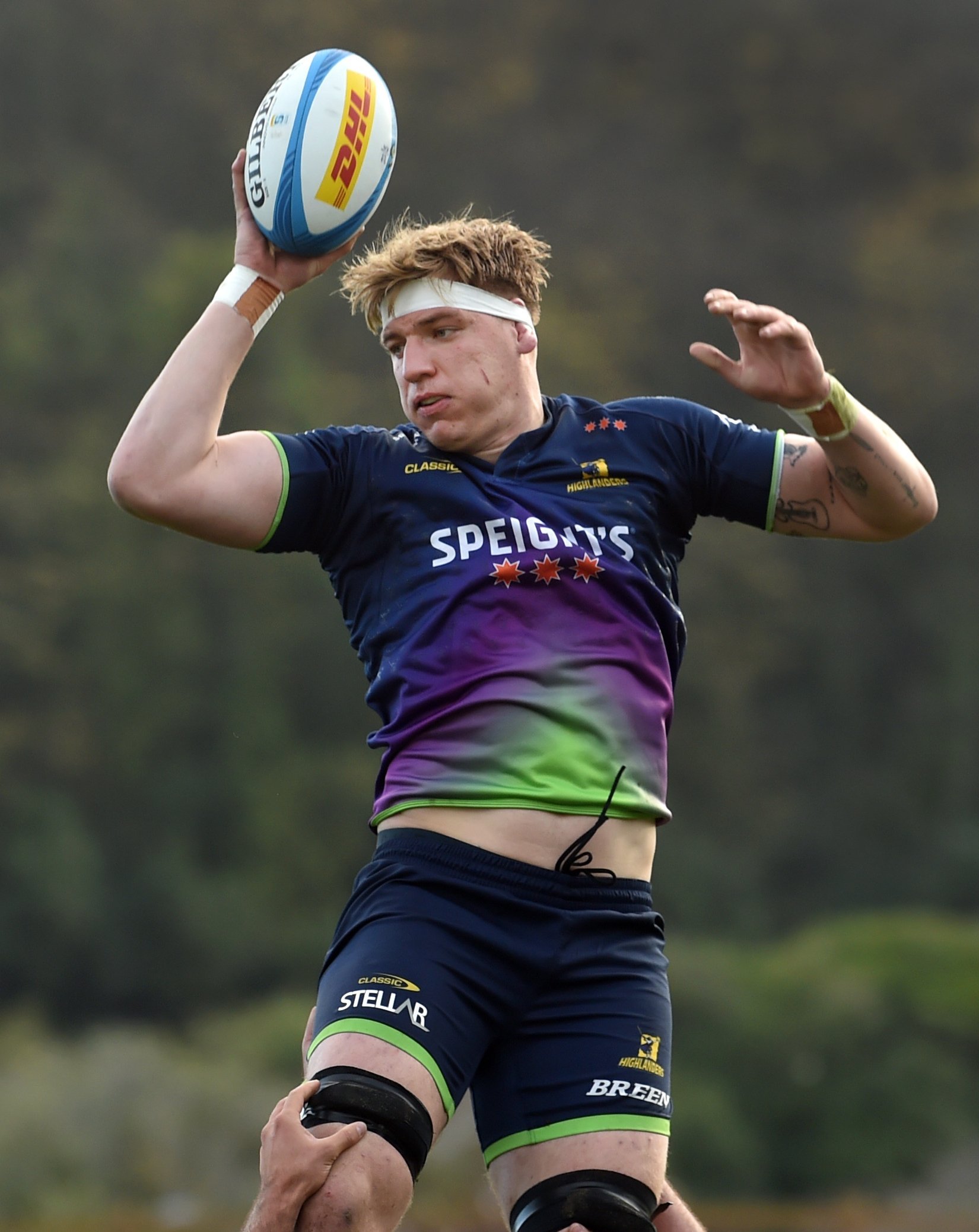 Highlanders lock Fabian Holland leaps high during a lineout drill at Logan Park earlier this week...