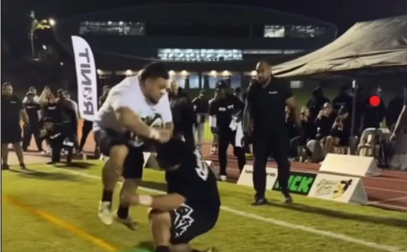 Two men collide during a Run it Straight sporting event in Auckland. Photo: Supplied / RUNIT...