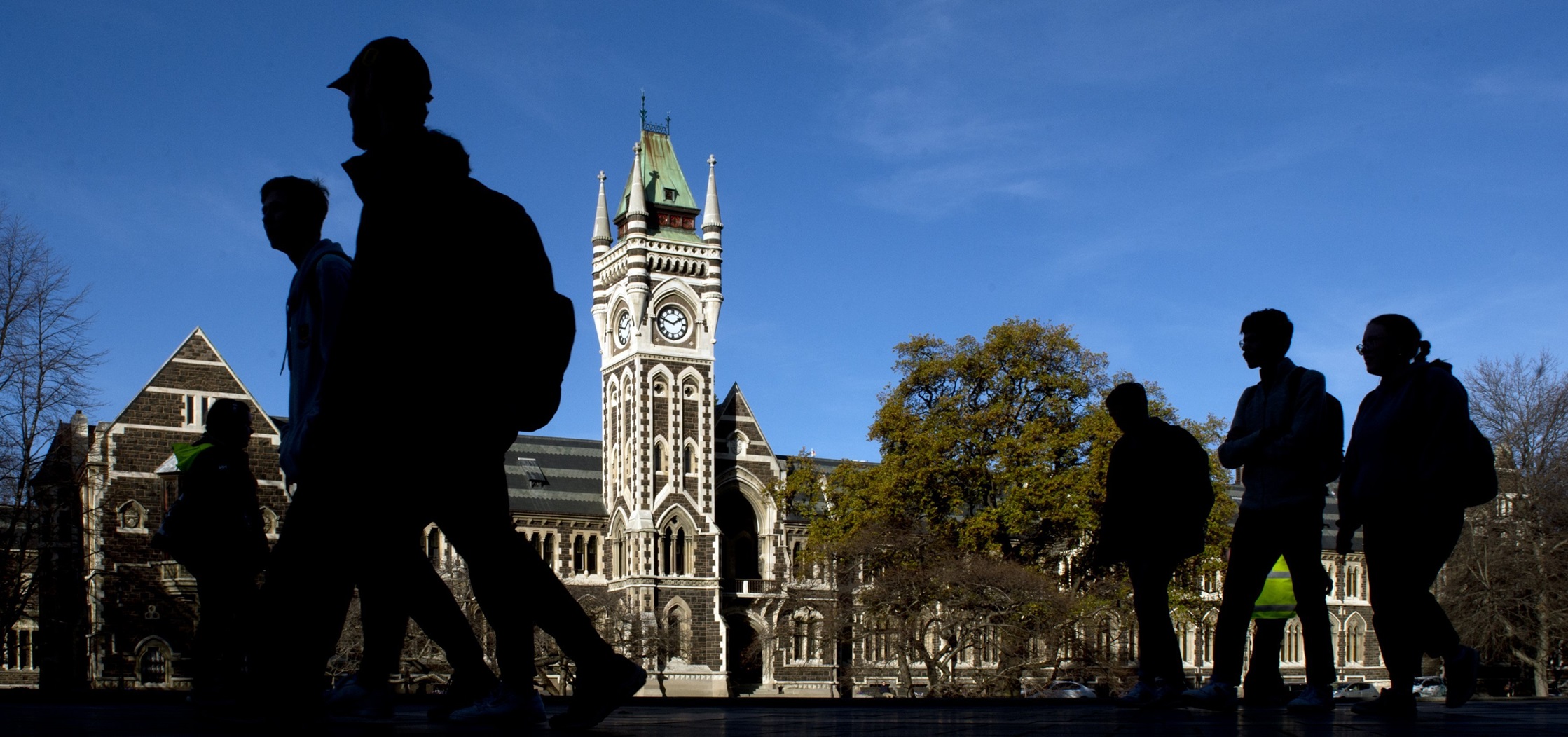 University of Otago students walk past the registry building. Photo: Gerard O'Brien