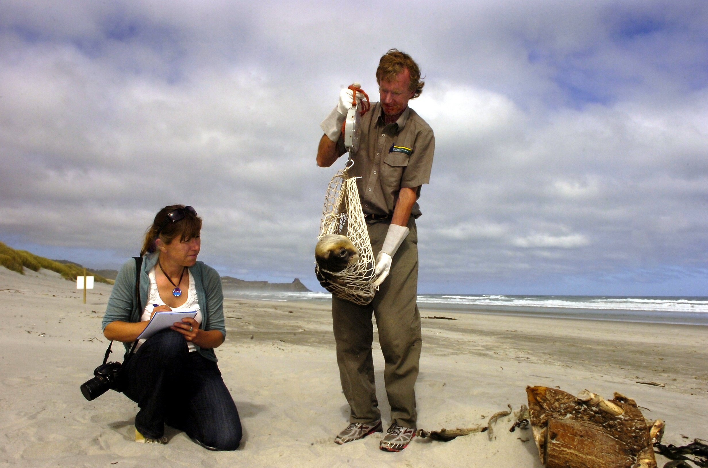Department of Conservation community relations officer Claudia Babirat and ranger Jim Fyfe weigh...