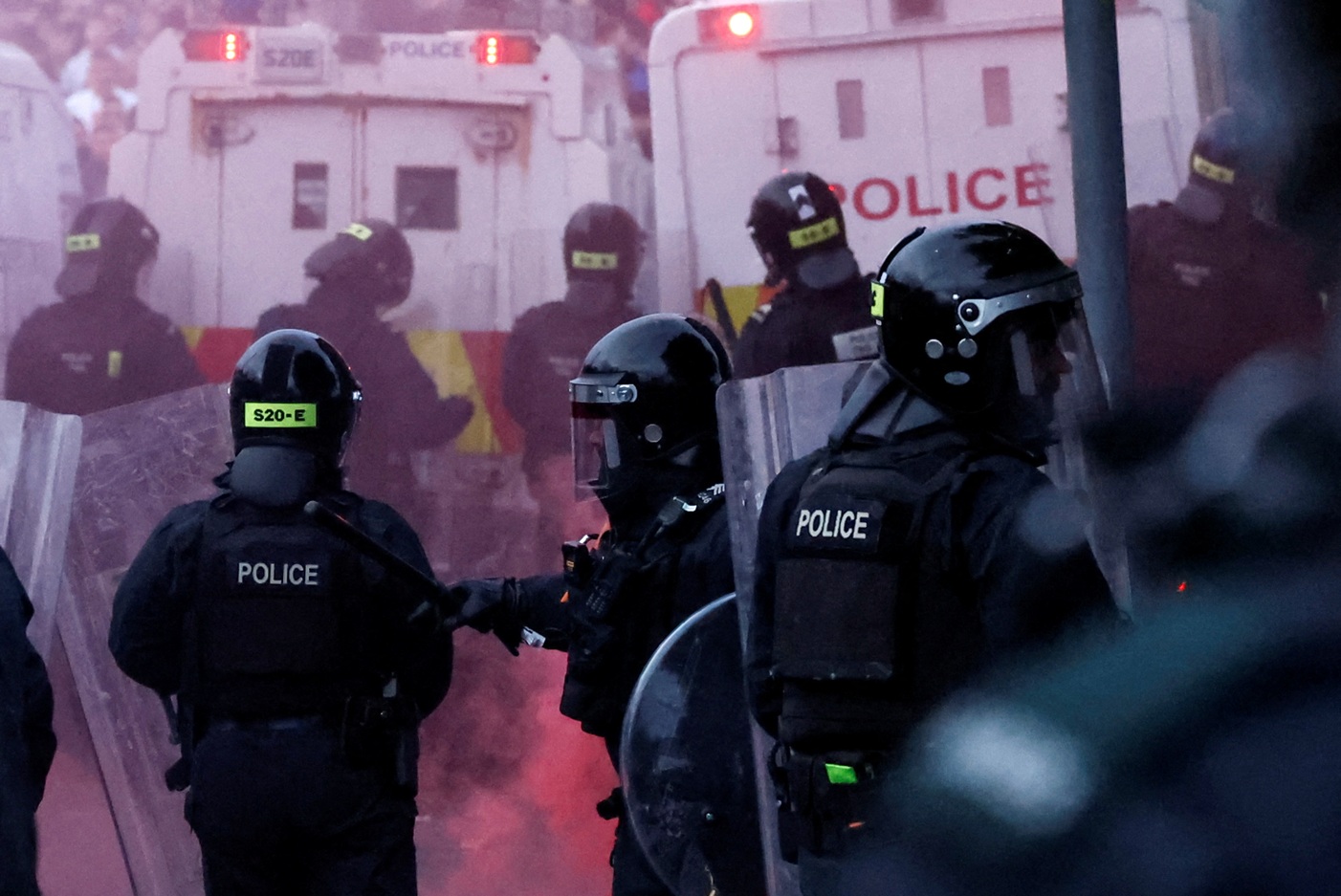 Riot police members gather as riots continue in Ballymena, Northern Ireland. Photo: Reuters