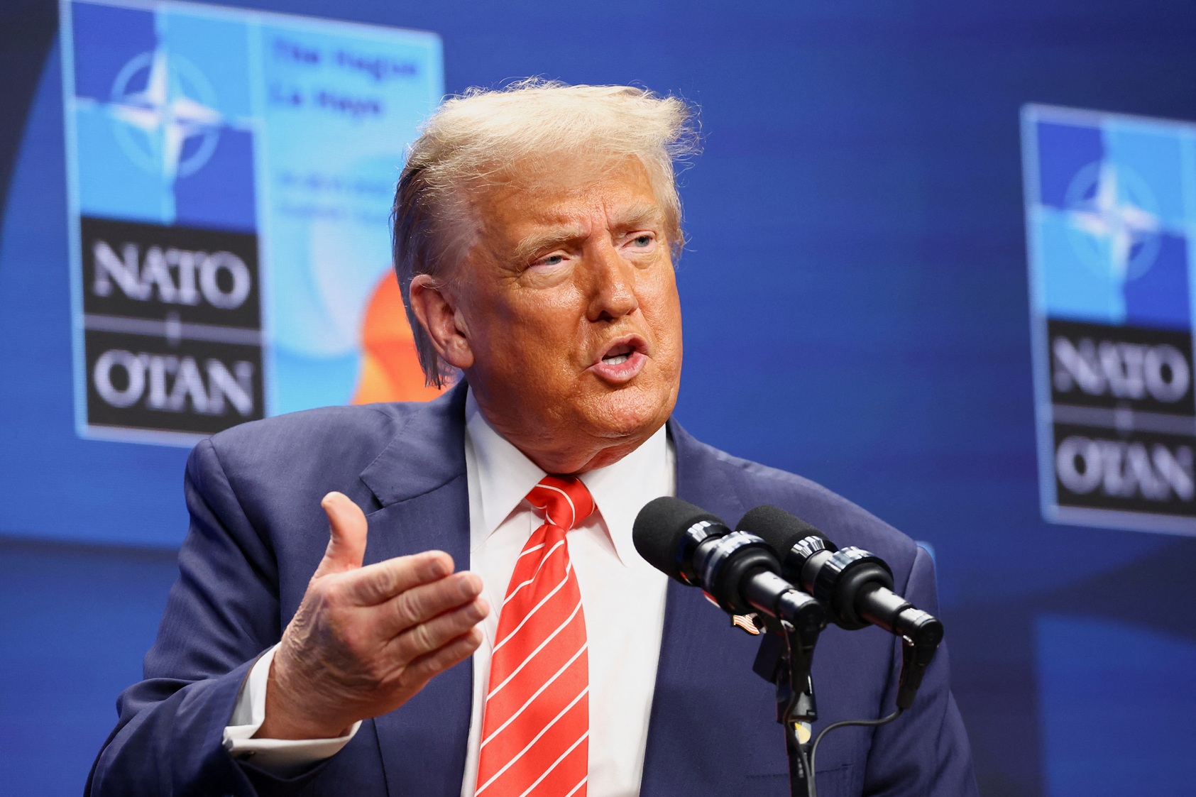 US President Donald Trump speaks during a press conference at the NATO summit in The Hague,...