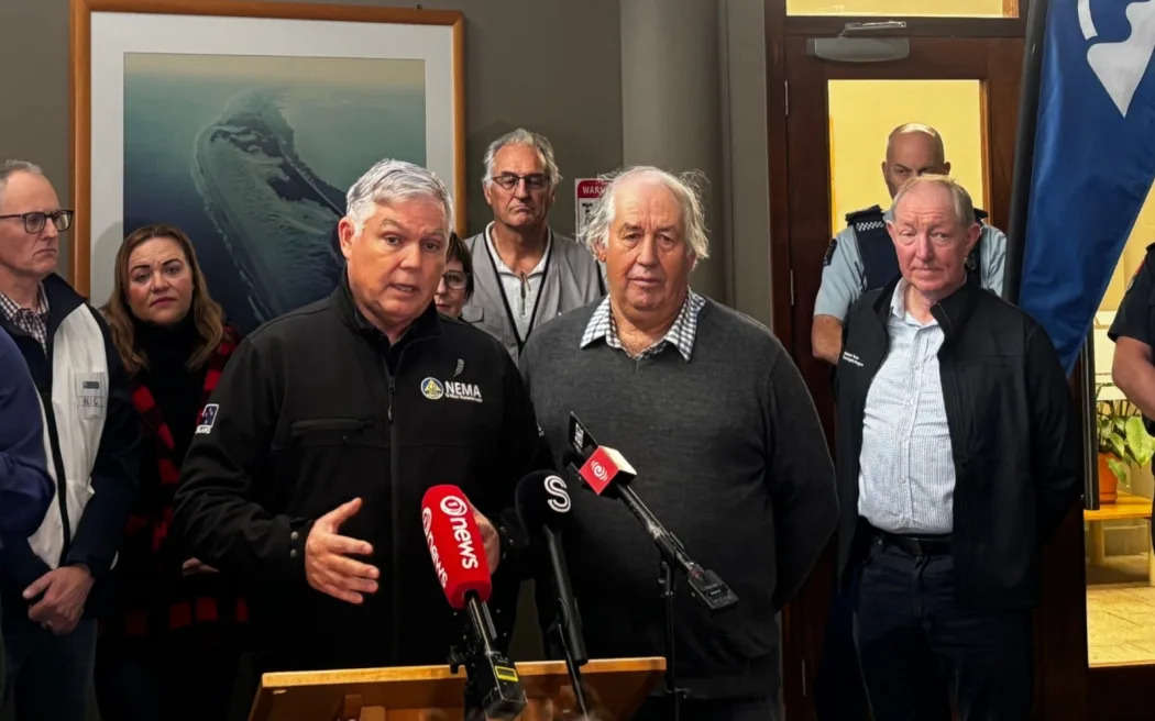 Minister for Emergency Management Mark Mitchell and Tasman Deputy Mayor Stuart Bryant speak to...