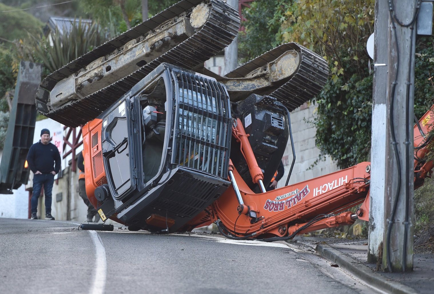 A digger that was set to operate at the site of a house fire in St Clair, Dunedin, fell off a...