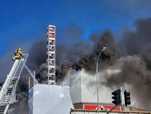 Smoke billowing out of the front of the carpark now above the New World supermarket in central...