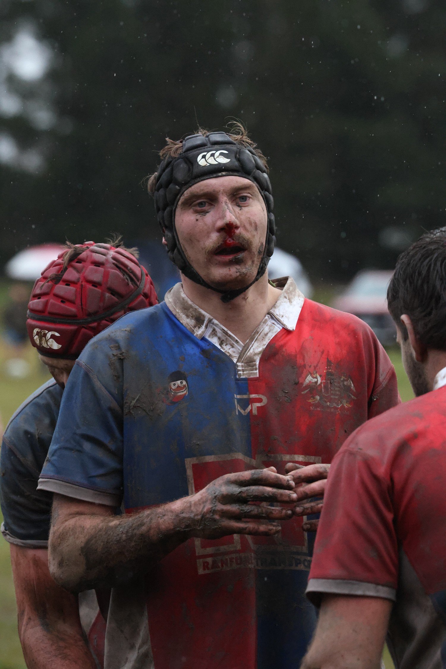 Mud-splattered Maniototo lock Ryan Becker prepares for a lineout during the game against...