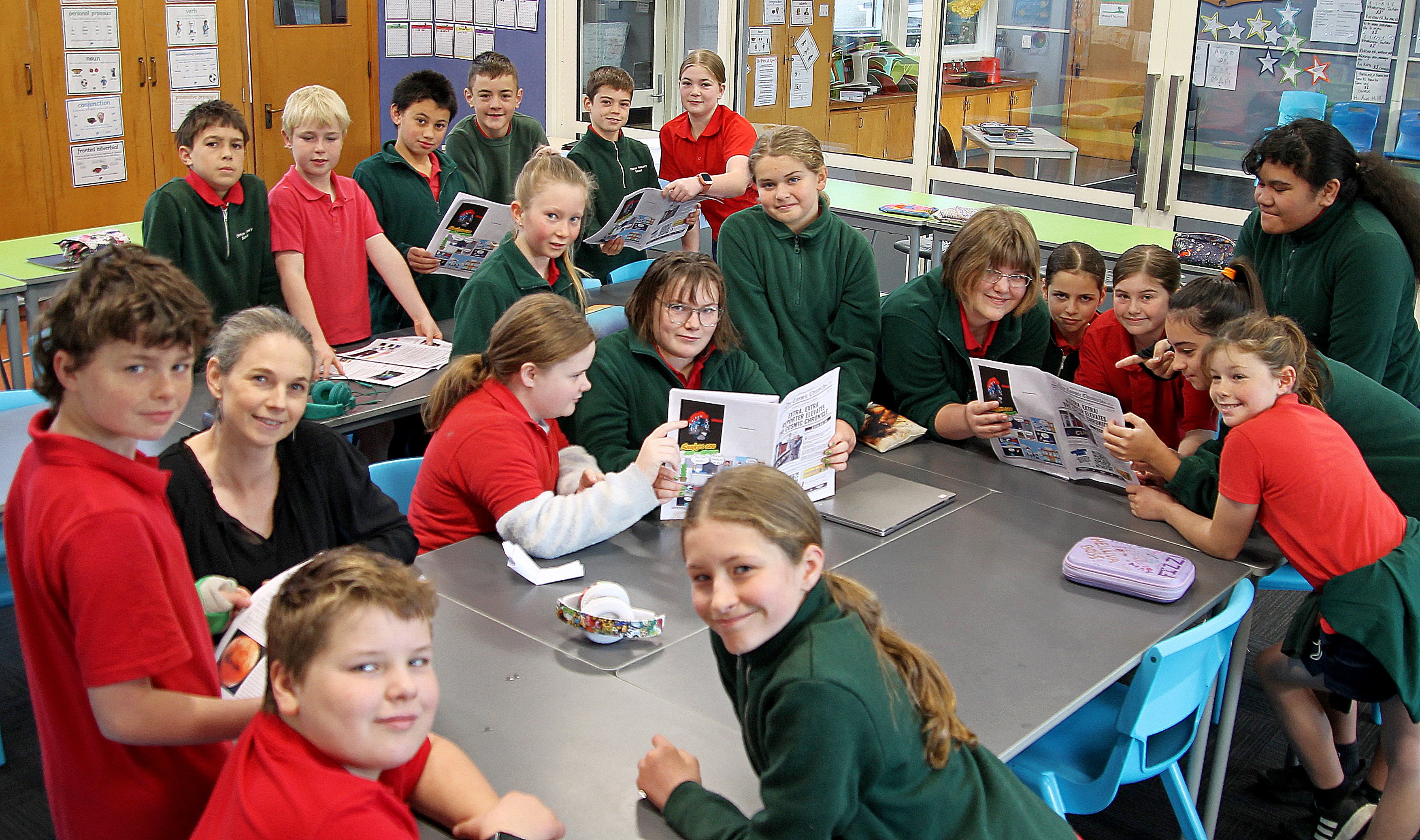 Clinton School’s Room 4 ‘‘Wairuna’’ check early drafts of their newspaper The Cosmic Chronicle,...