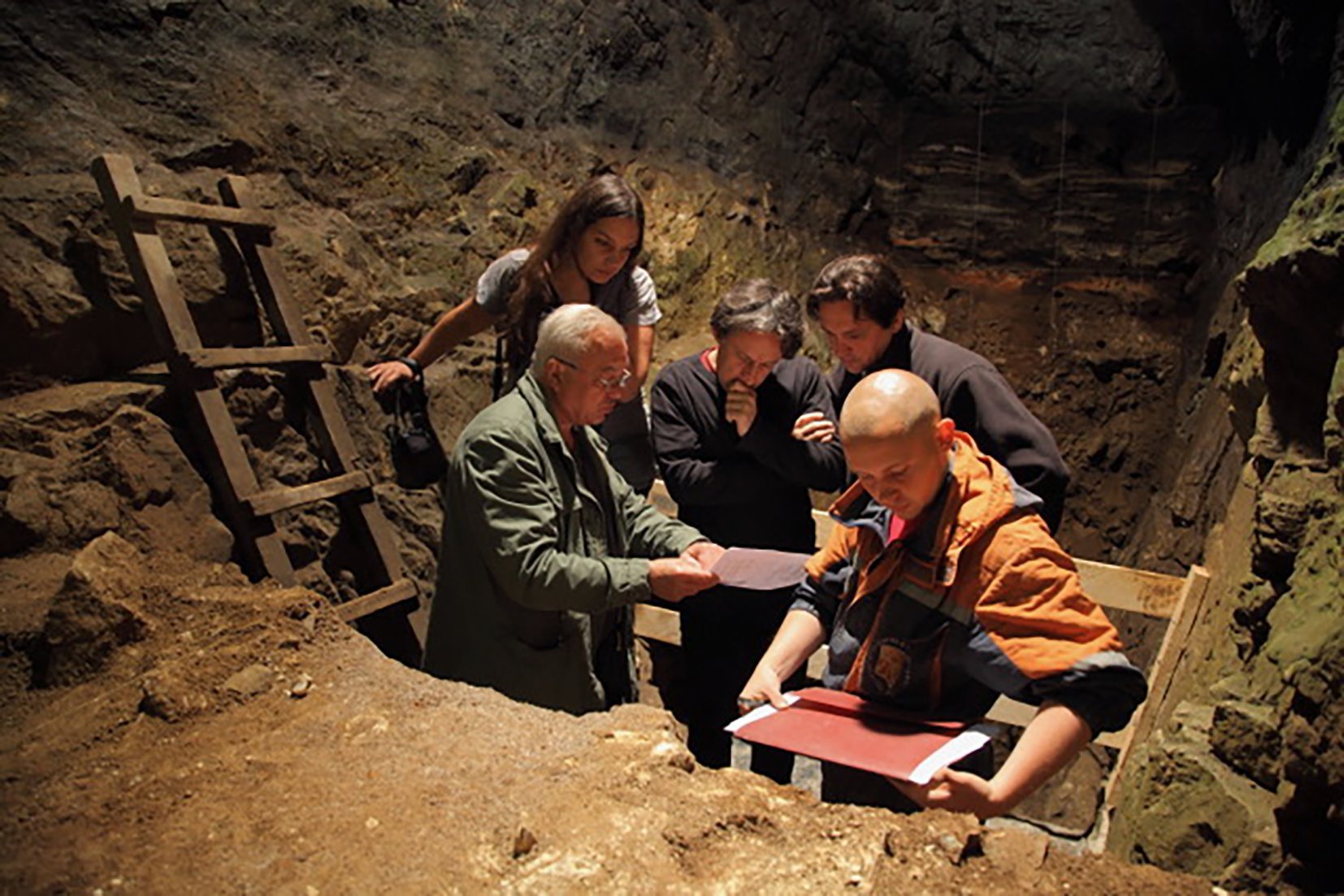Michael Shunkov (front left) and Maxim Kozlikin (back right) — the main excavators at Denisova...