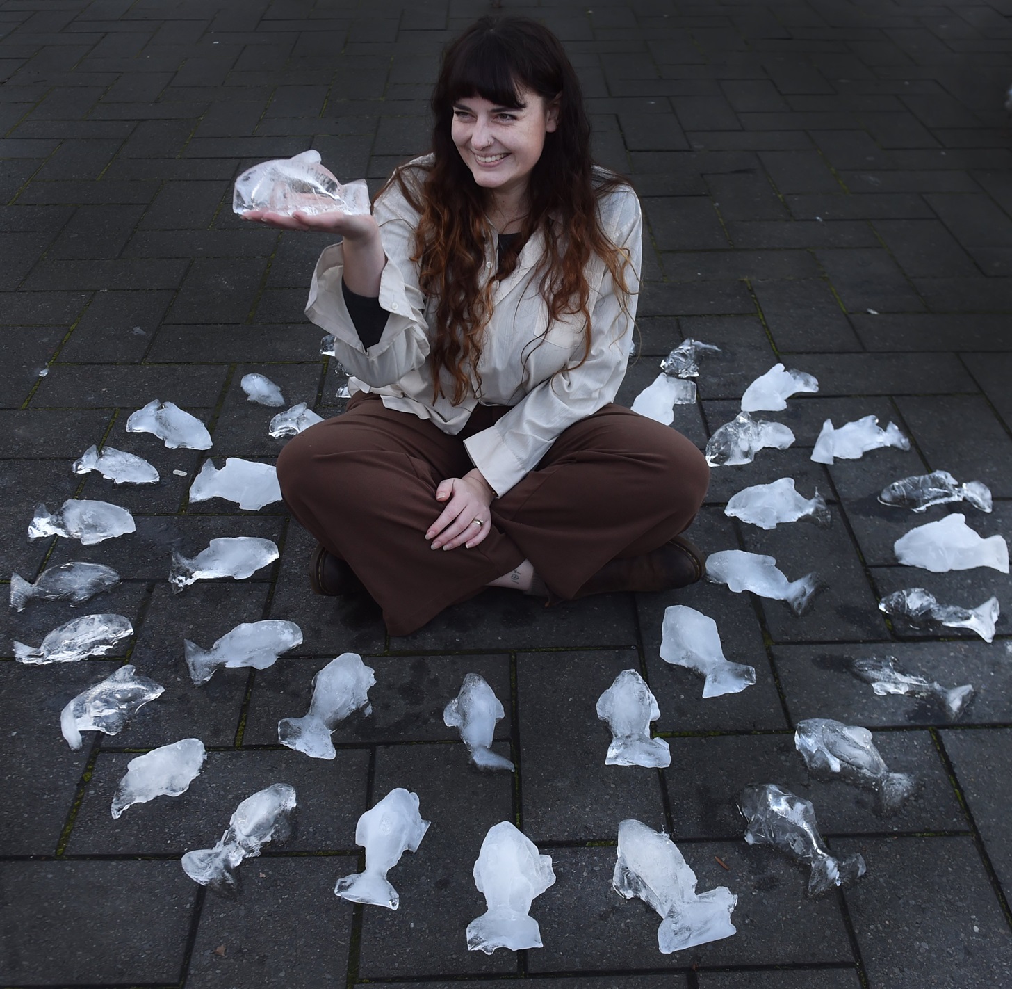 Otago Polytechnic Dunedin School of Art student Jemma Edenborough displays her 54 Māui dolphins...