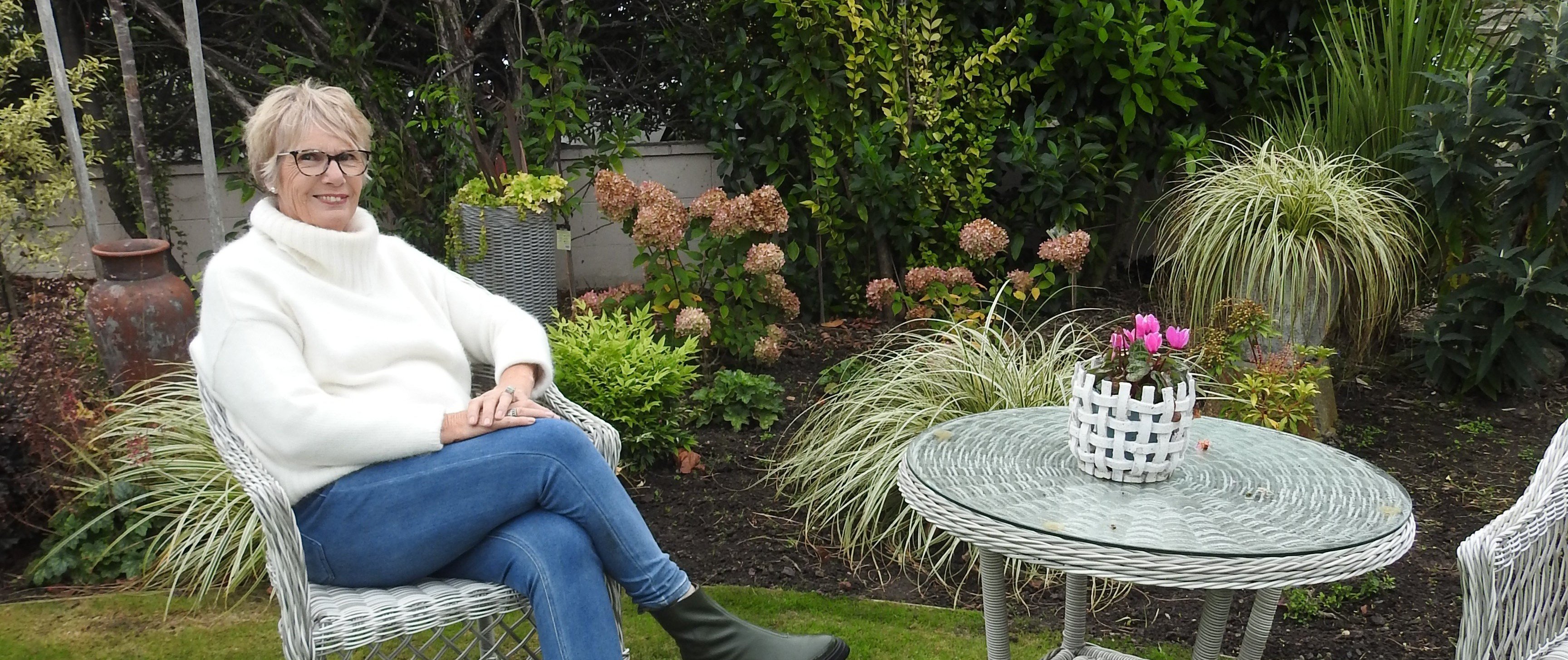 Kris Wills sits in her St Clair garden. PHOTOS: LOUISE FRAMPTON