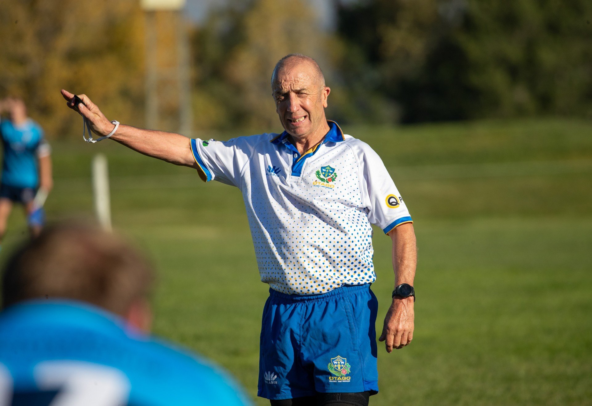 Gary Smith referees a game of Central Otago club rugby. Photo: Richard Jones