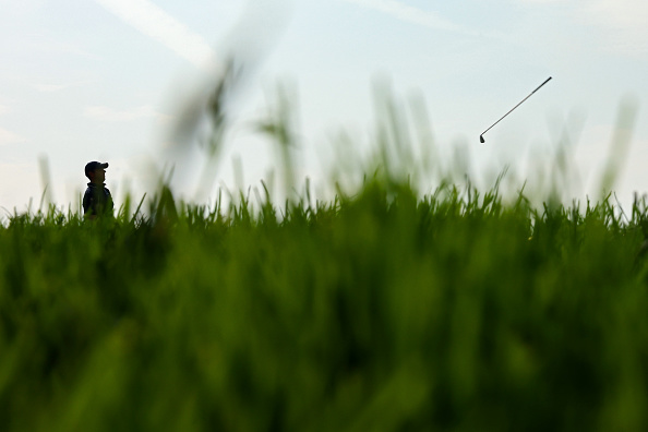 Rory McIlroy throws his club in frustration during a brutal day at the US Open at Oakmont. Photo:...