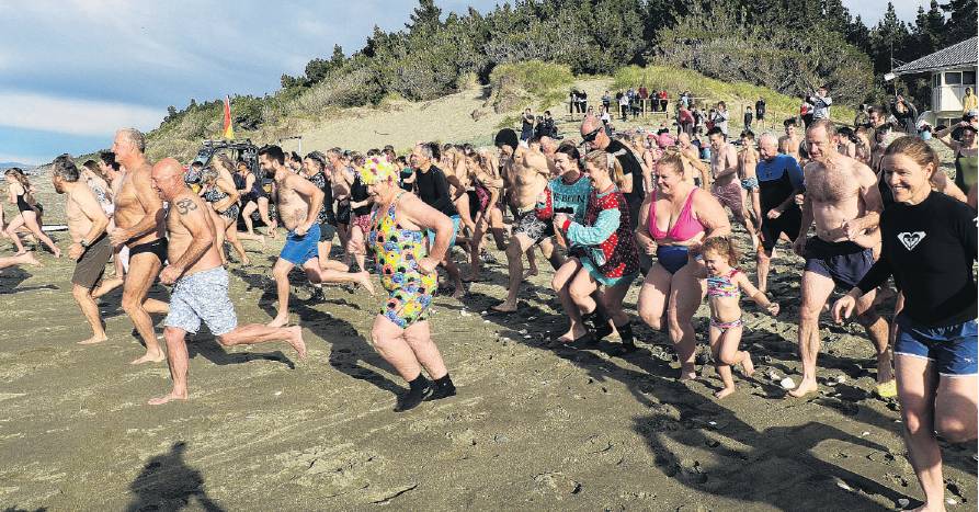 A couple of hundred hardy souls took part in the Polar Plunge at Waikuku Beach on Matariki Day....