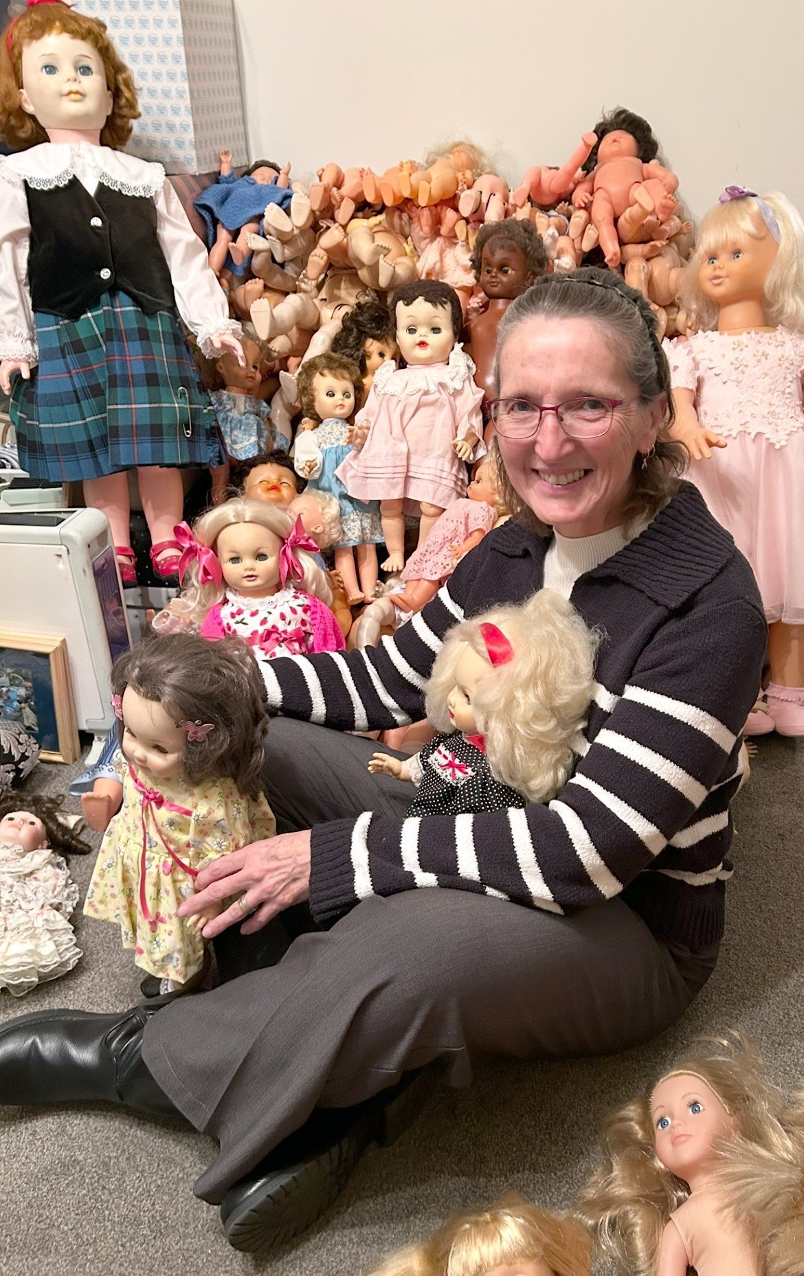 Queenstown woman Cathryn Kabuji is selling her large doll collection. Photo: supplied