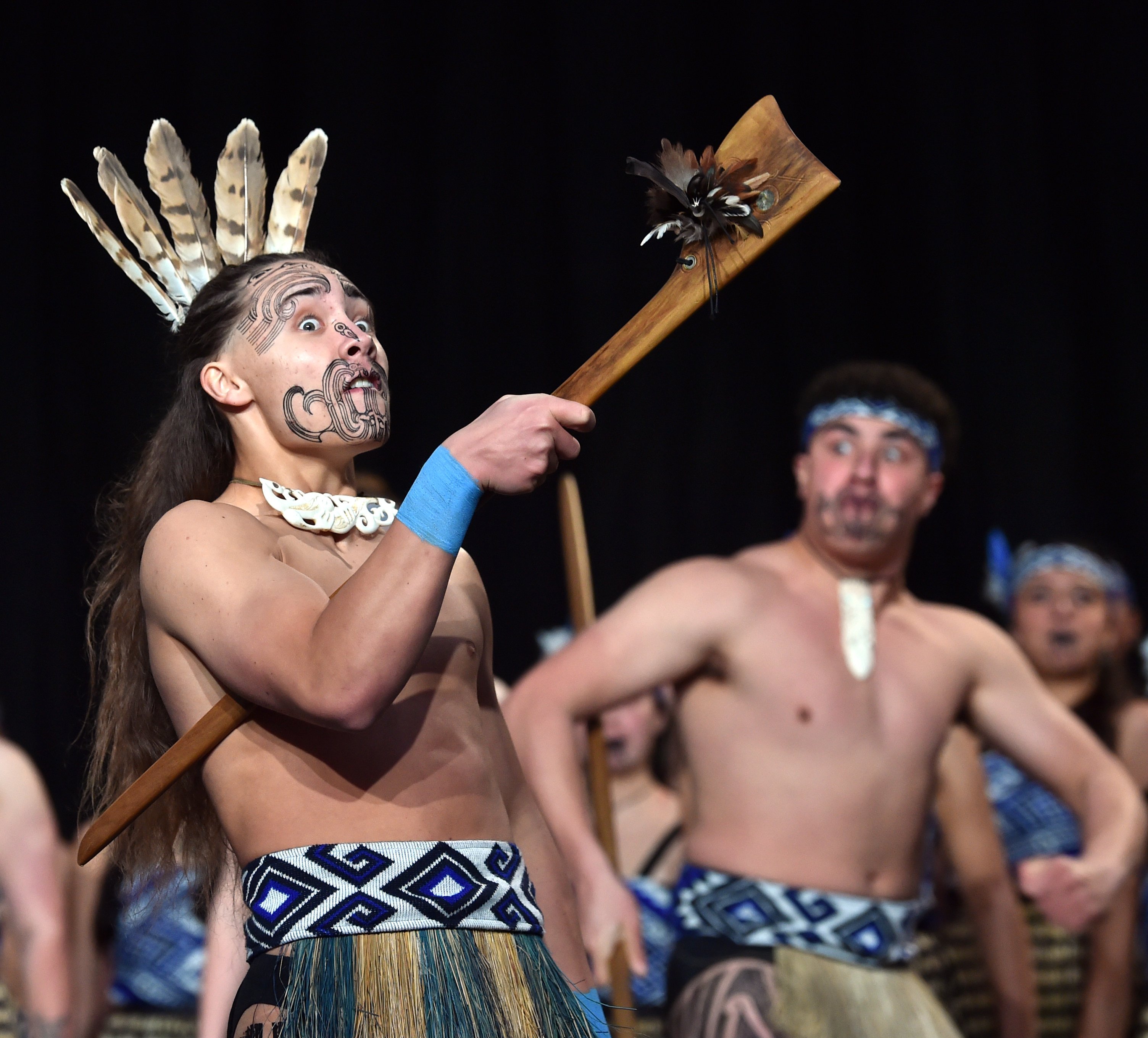 King’s High School student Archibald Valentine (left), 16, holds a tewhatewha, a Maori weapon, as...