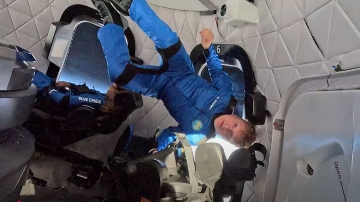 Mark Rocket out of his seat during the sub-orbital flight on Blue Origin's NS-32 mission. Photo:...