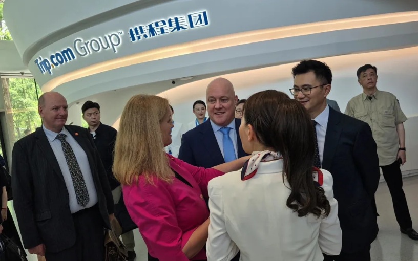 Prime Minister Christopher Luxon (centre) and Tourism Minister Louise Upston (to his left) at...