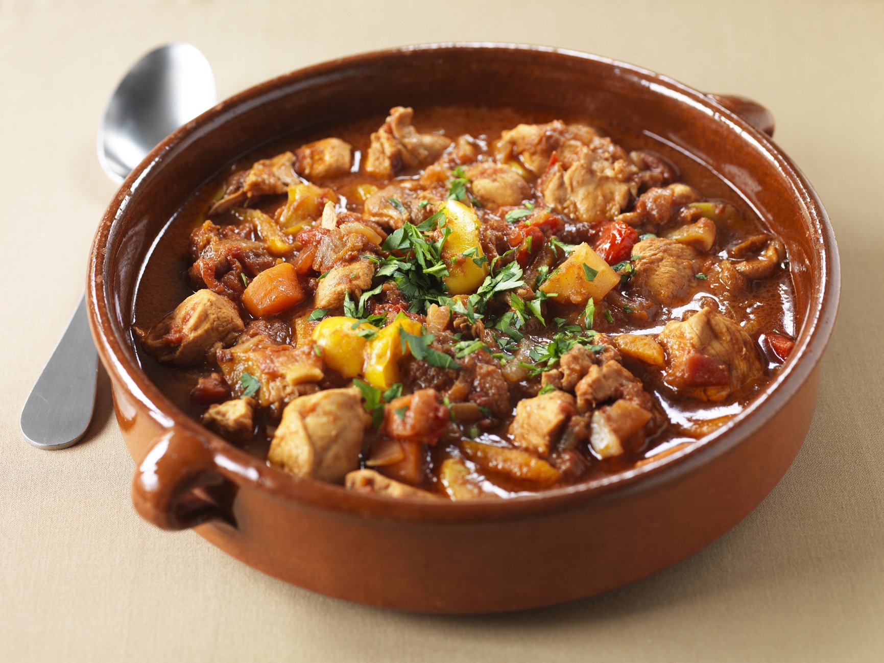 Moroccan chicken stew is full of warming spices, tender chicken, and hearty winter veges. Photo:...