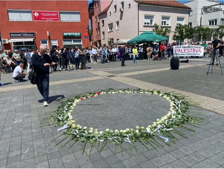 A "memorial in absence" wreath in Prijedor. Every year since 2013, locals have placed  roses in a...