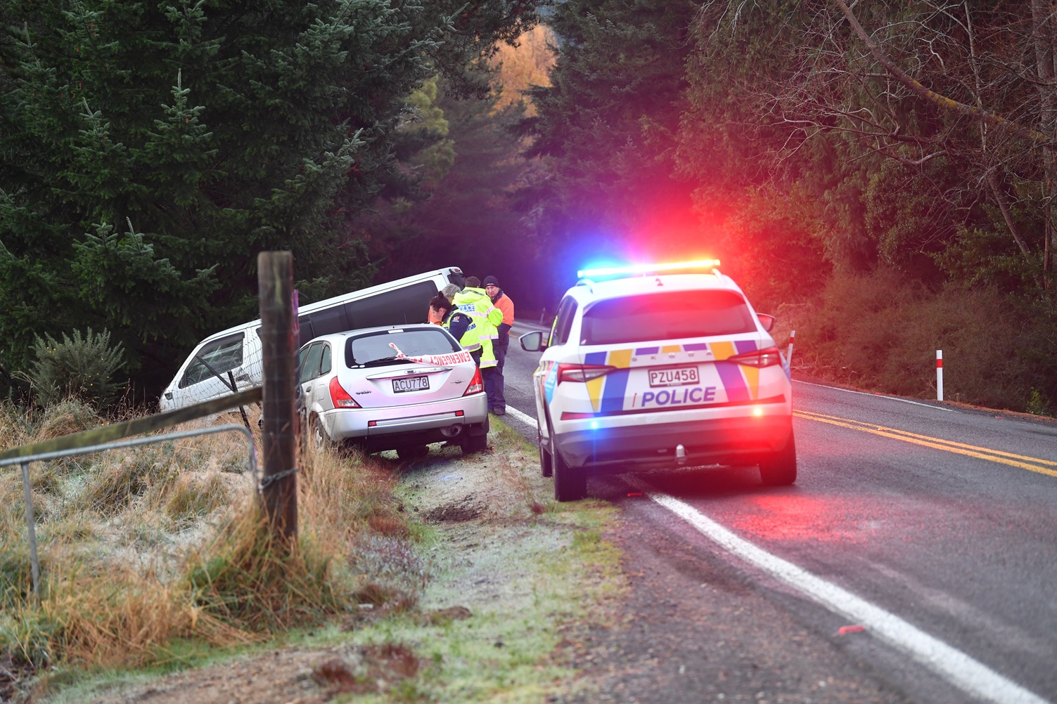 A van and a car slid into a ditch after slipping on ice on Three Mile Hill Rd yesterday. Photo:...