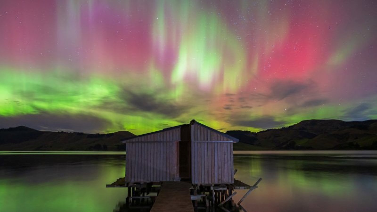 Another aurora is visible over Hoopers Inlet, on Otago Peninsula, on Sunday night. Photo: Brendon...