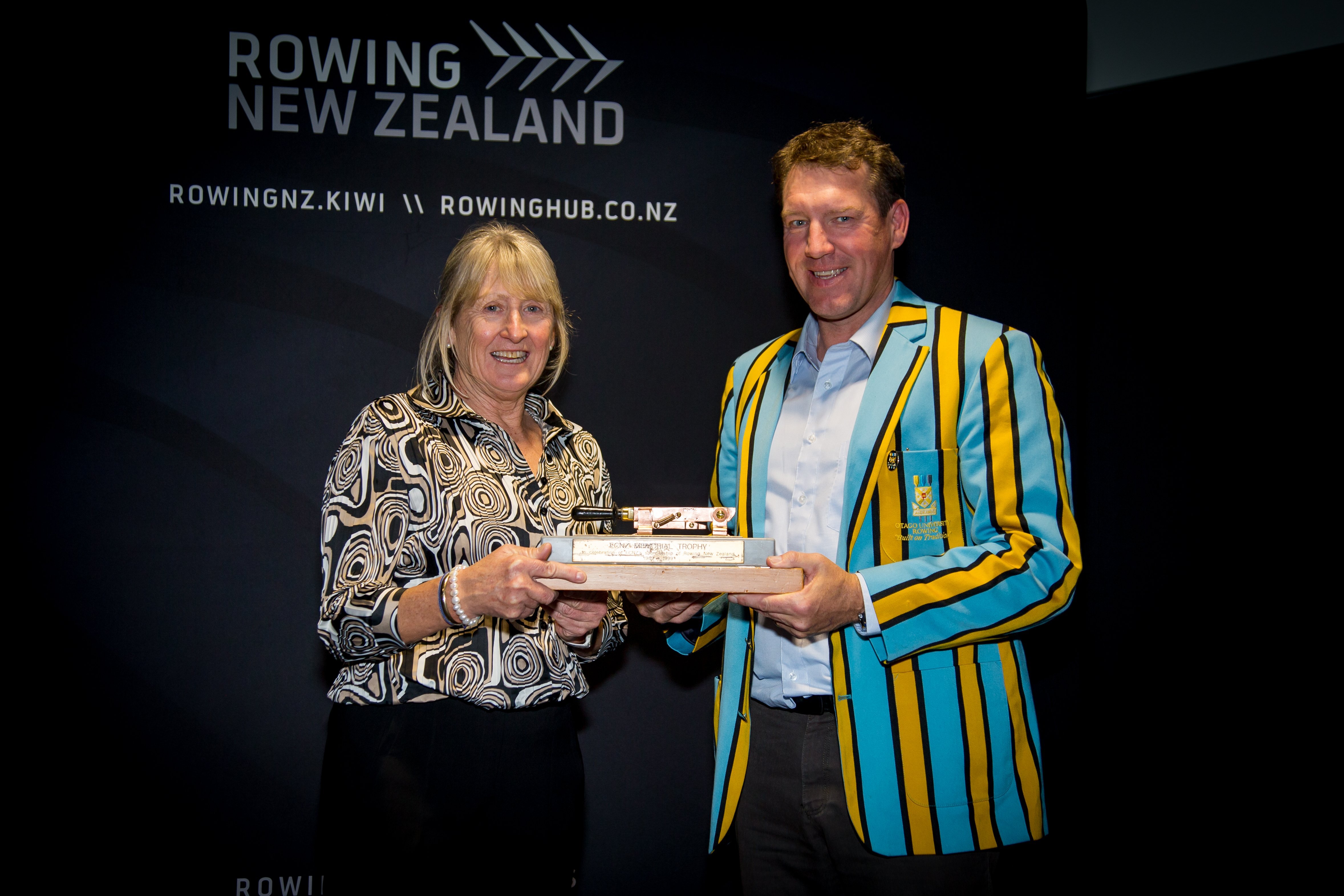 Rowing New Zealand board member Virginia Le Bas presents the award for club of the year to Otago...