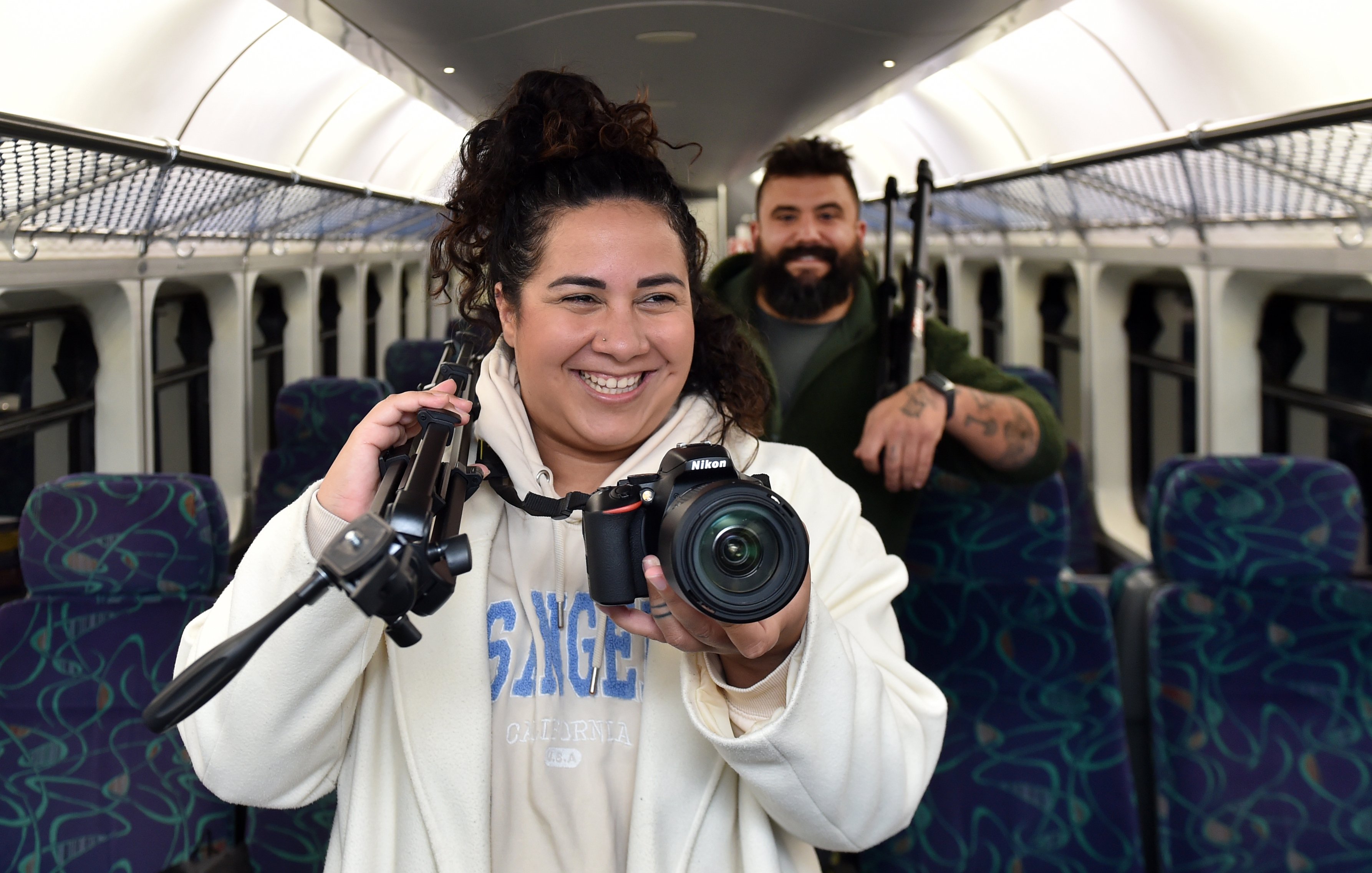 Lindsay Sinien, 36 (left), and Jurij Boccioli, 35, both of France, board the Stargazer train to...