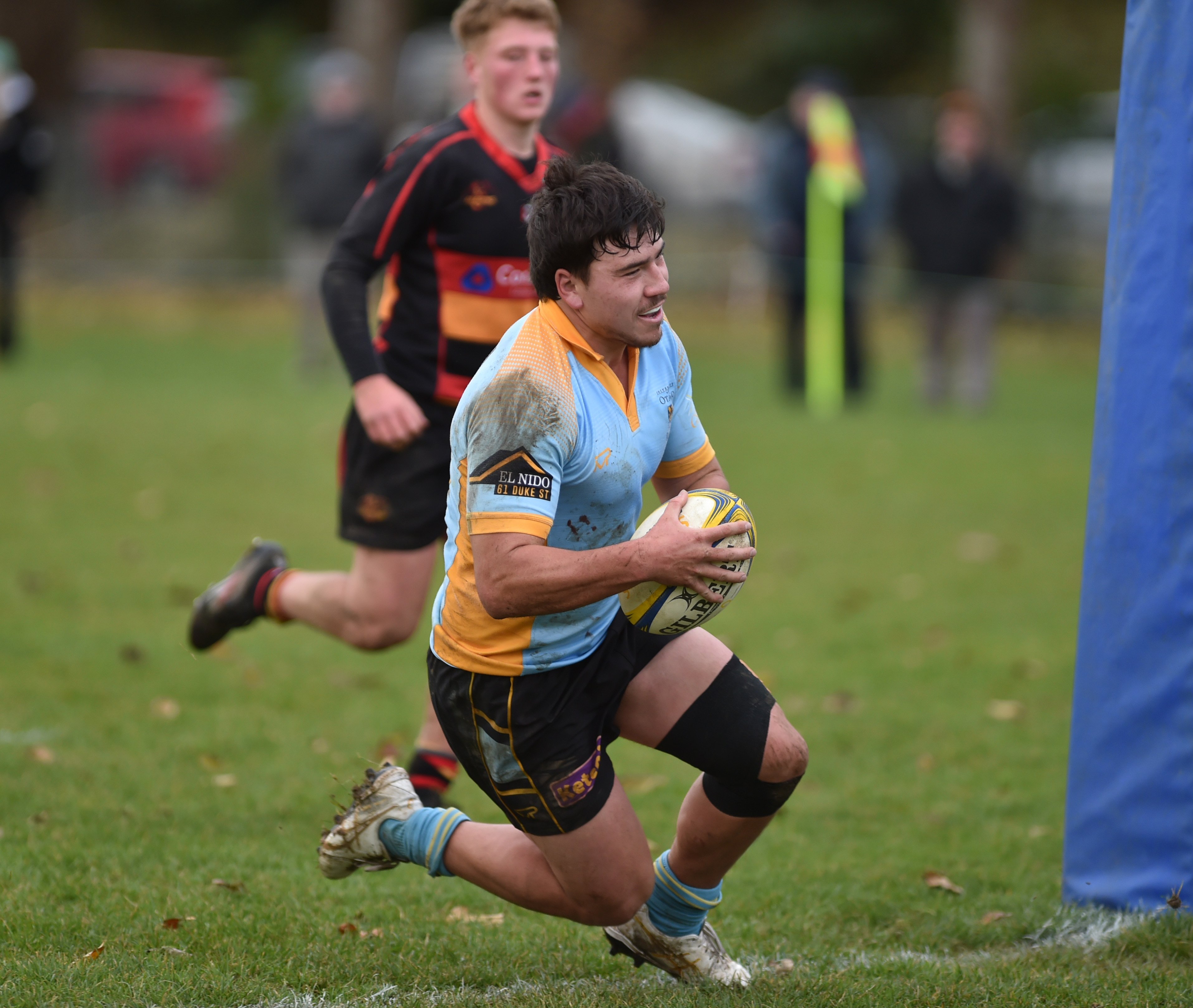 University second five Mac Harris dives over for a try against Zingari-Richmond during a Dunedin...