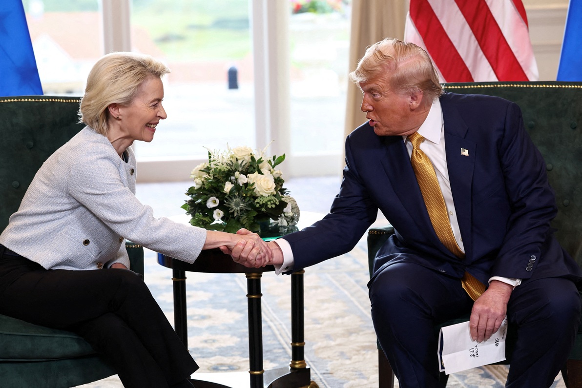 European Commission President Ursula von der Leyen shakes hands with US President Donald Trump after an announcement of a trade deal between the US and EU, in Turnberry, Scotland. Photo: Reuters