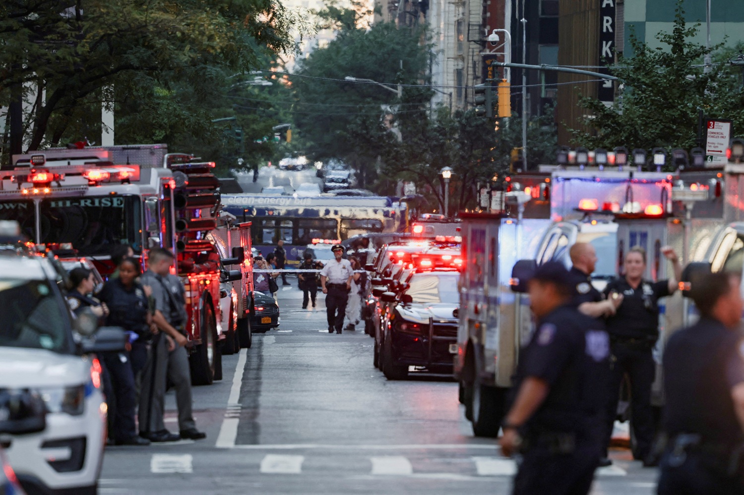 Police officers assemble at the scene of an active shooter situation in Manhattan. Photo: Reuters