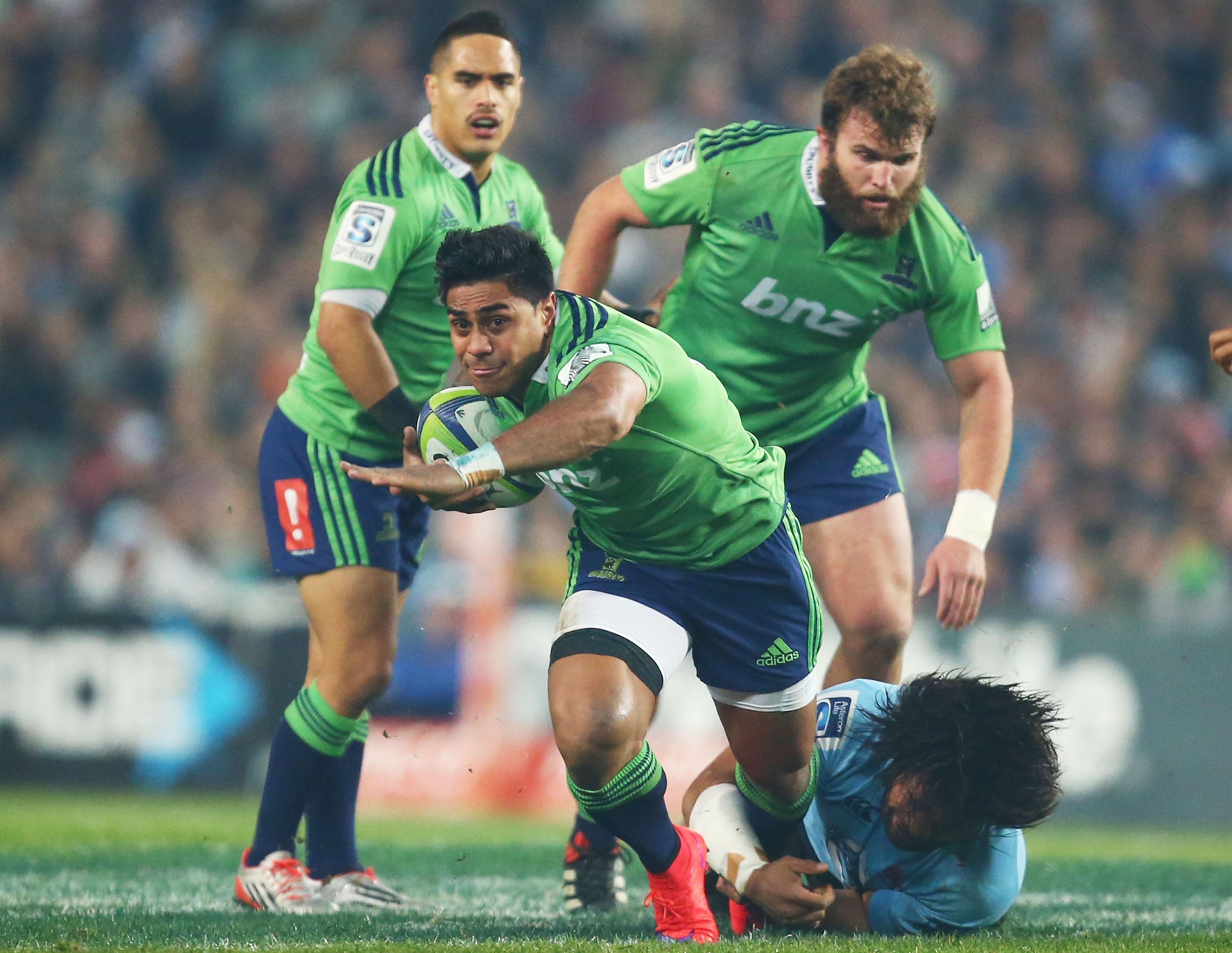 Malakai Fekitoa on the burst while dressed in the polarising green jersey.

