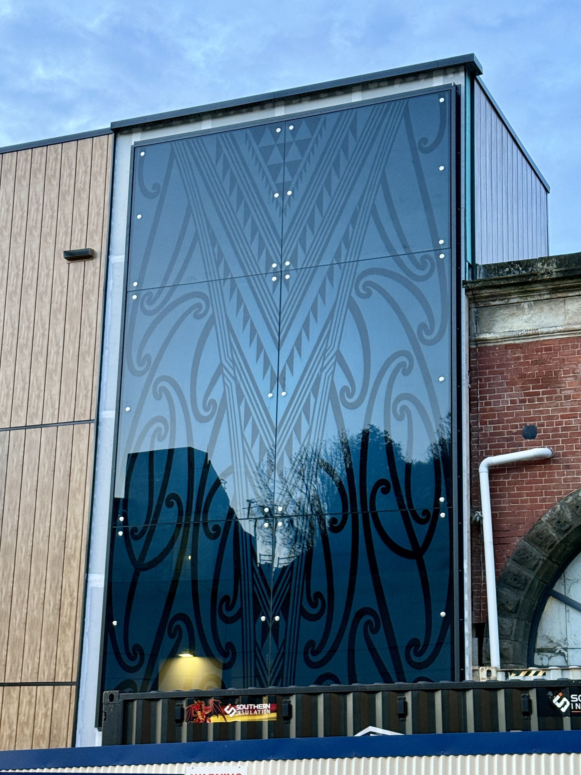 The pūhoro patterns on the panels depict the rivers and streams that run through Dunedin - in...