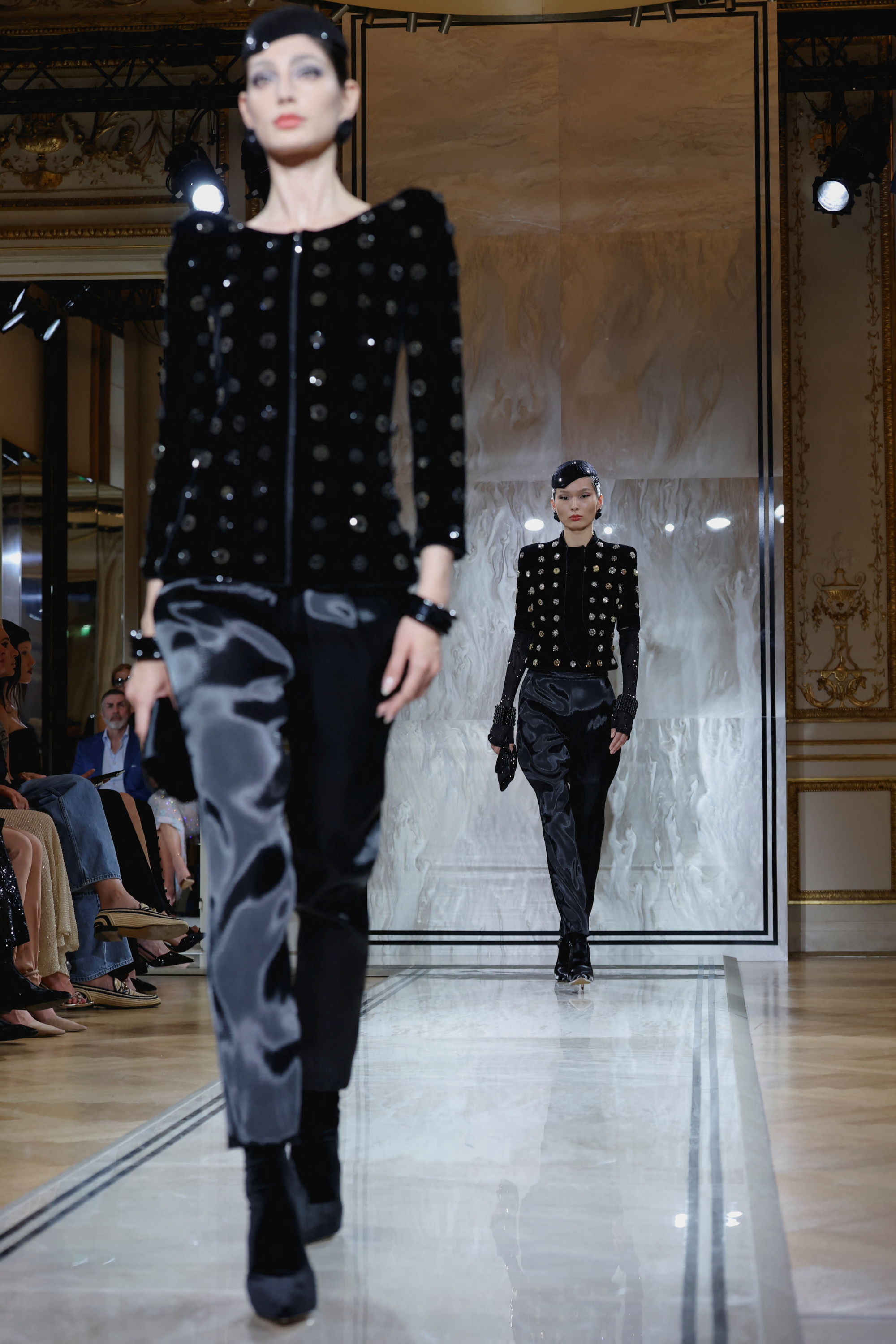 Black velvet pantsuits and slender dresses were on show at Armani Prive. Photo: Reuters