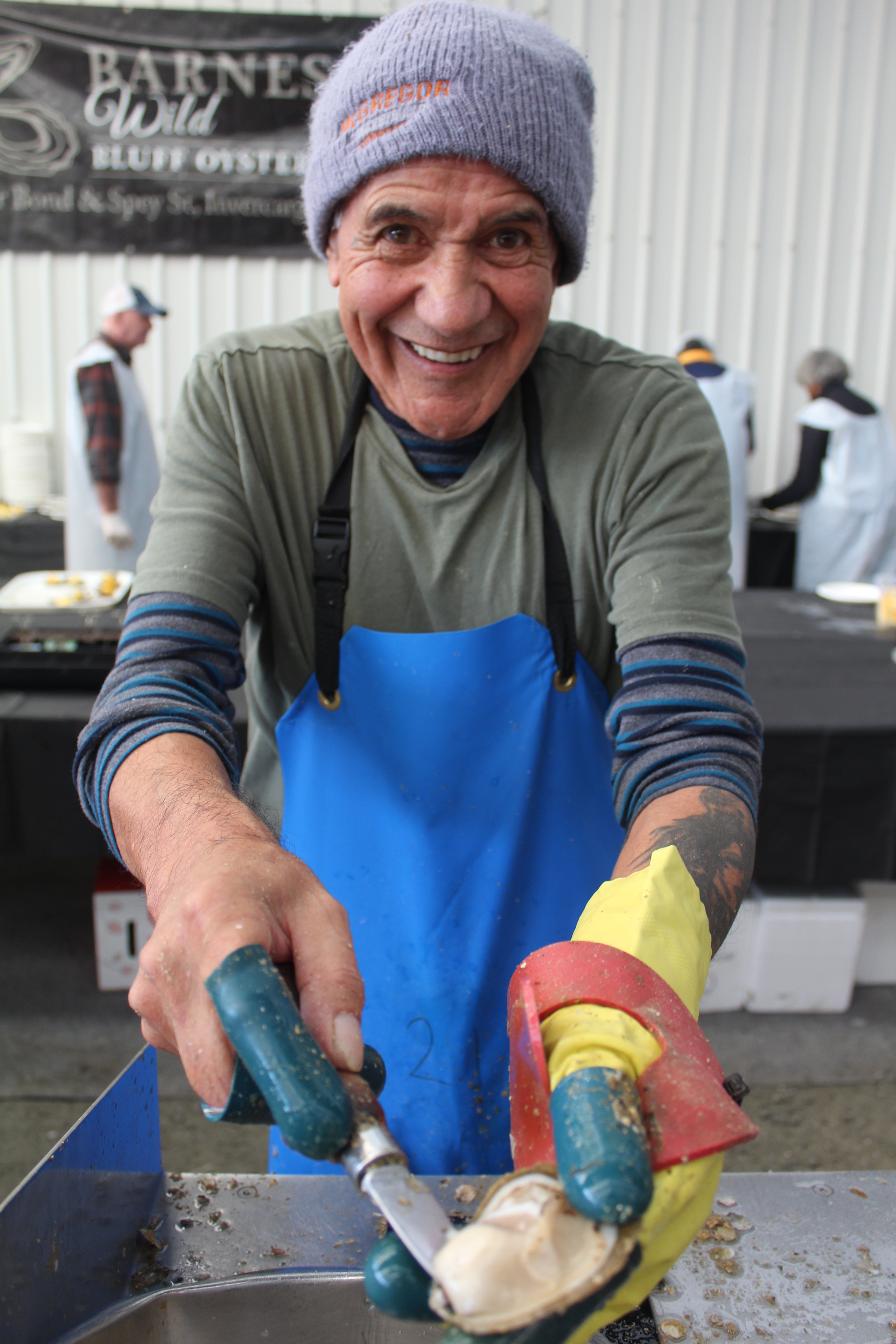 Barnes Wild Bluff Oysters staffer Roger Matahaere shucks hundreds of oysters for the hordes of...