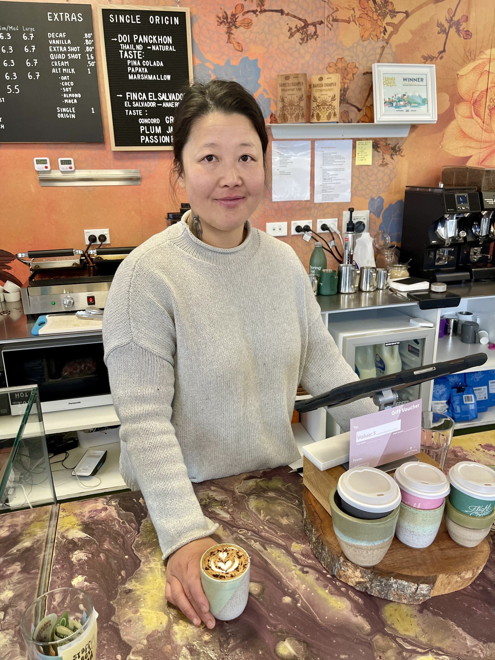 Cafe owner Bonnie Lam doing her thing at the Coffee Dojo cafe in Wānaka. PHOTO: RAWAN SAADI