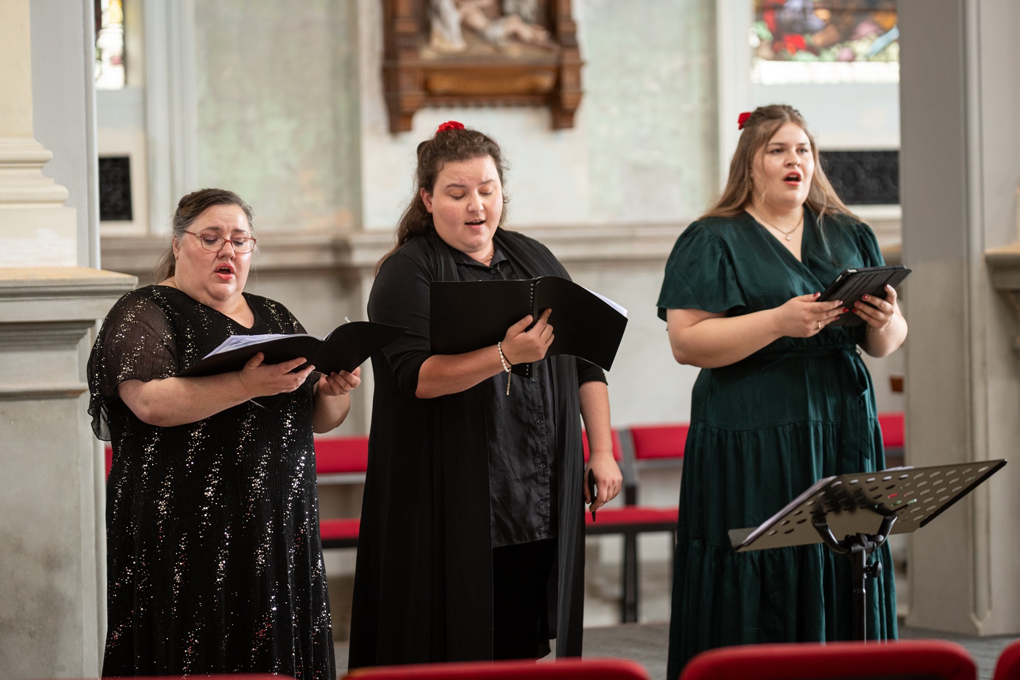 Natasha Manowitz (centre) is also studying singing, performing here with Claire Barton (left) and...