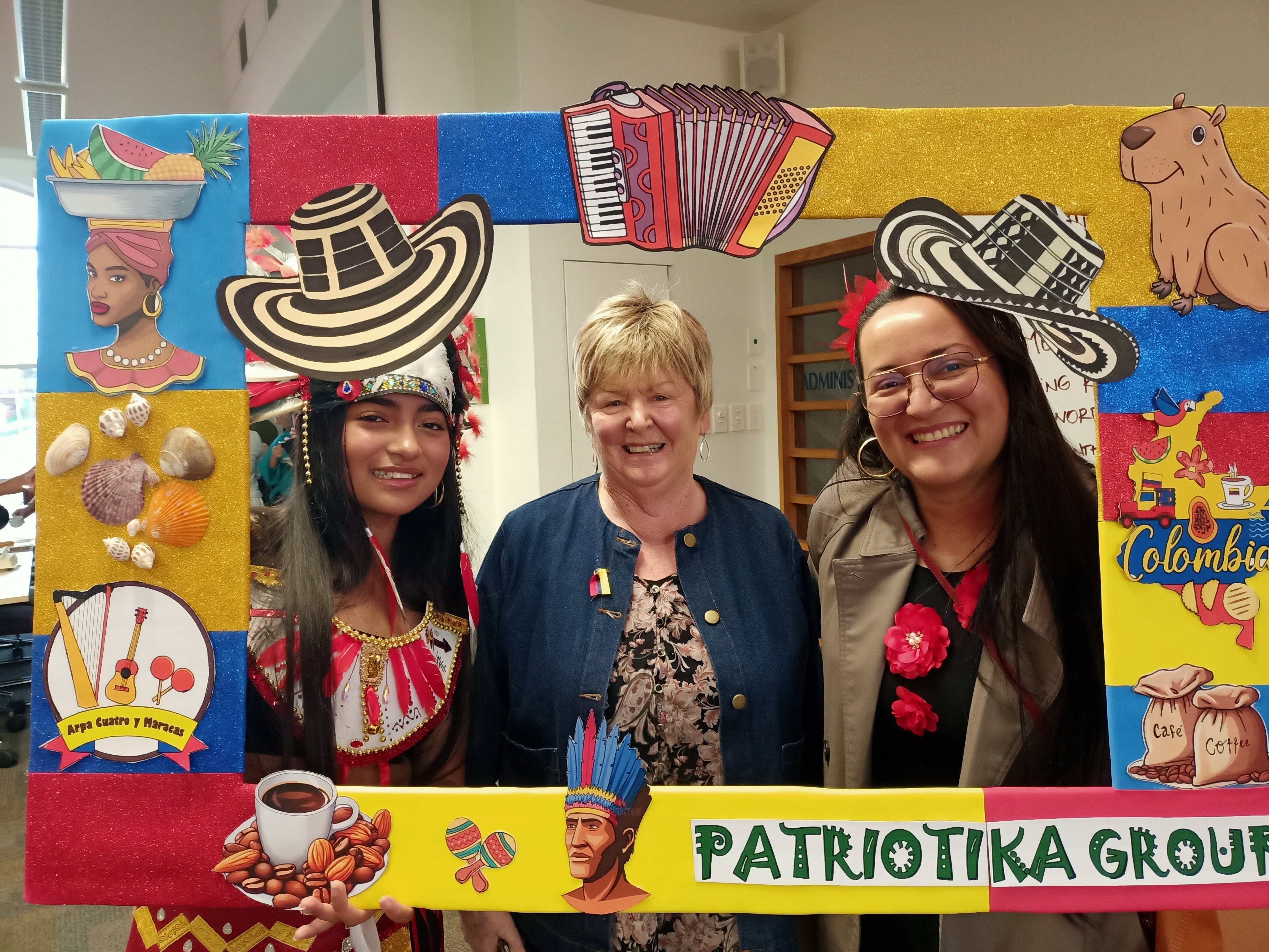 Invercargill City councillor Trish Boyle (centre) took a break on Friday to celebrate Colombian...